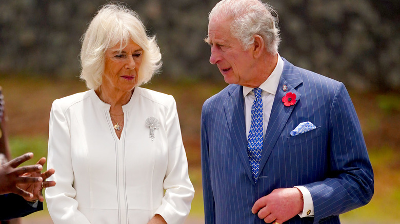 Queen Camilla and King Charles stand side by side