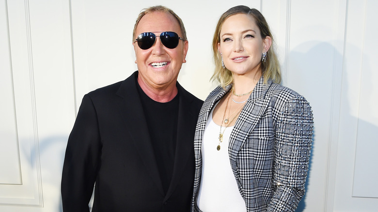 Kate Hudson with Michael Kors at the Michael Kors Fashion Show 2020, showing off a 2020 fashion trend