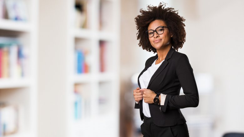 woman in pant suit and blazer