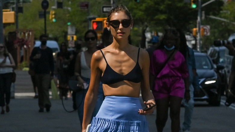 Woman crossing the street during NYFW