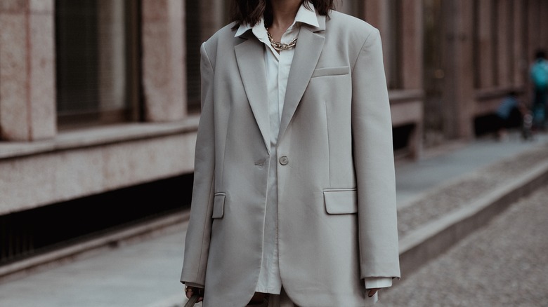 woman on the street in a blazer