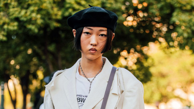 Chloe Tang wearing a beret