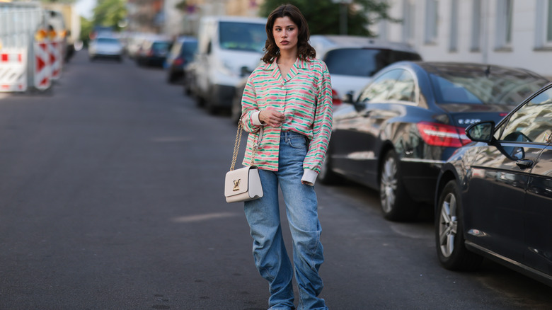 Woman in baggy jeans