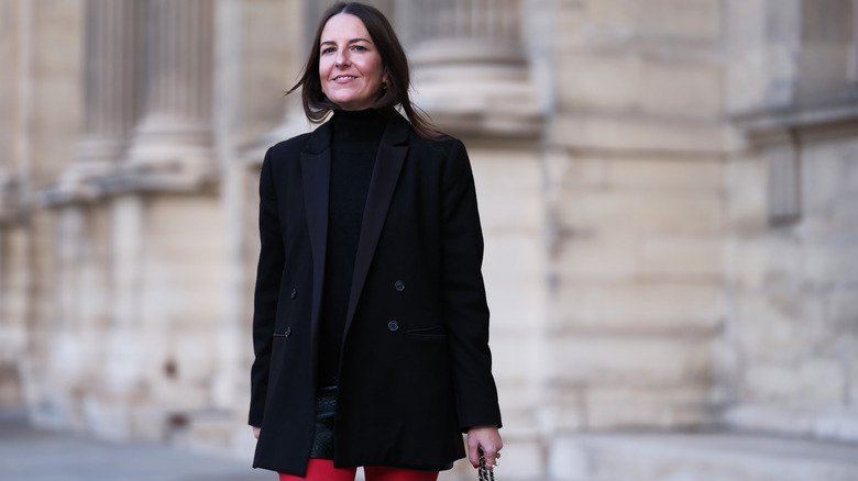 Woman in a black oversized blazer