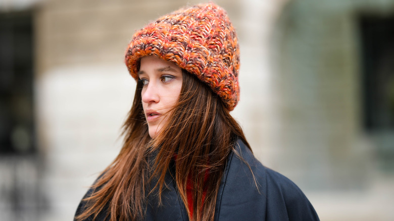 A woman wearing a beanie 