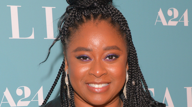 Phoebe Robinson posing for a picture at an event