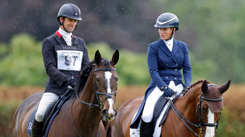 Zara Tindall and another rider on horse back 