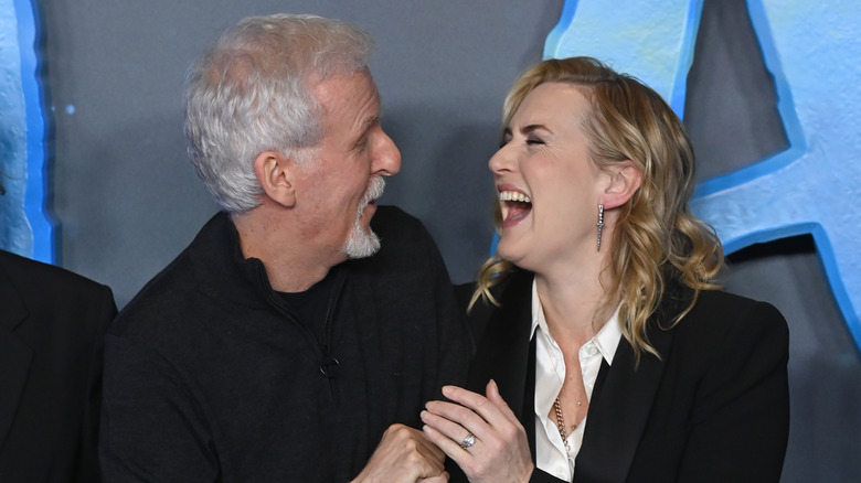 Kate Winslet and James Cameron laughing