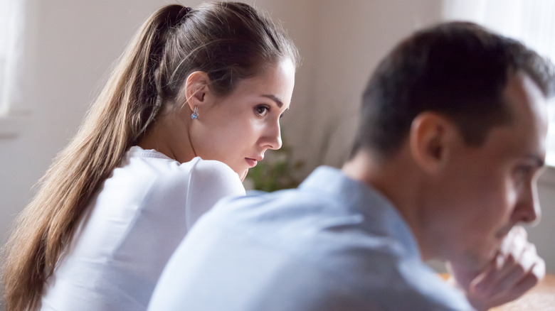 girl looking worried with partner