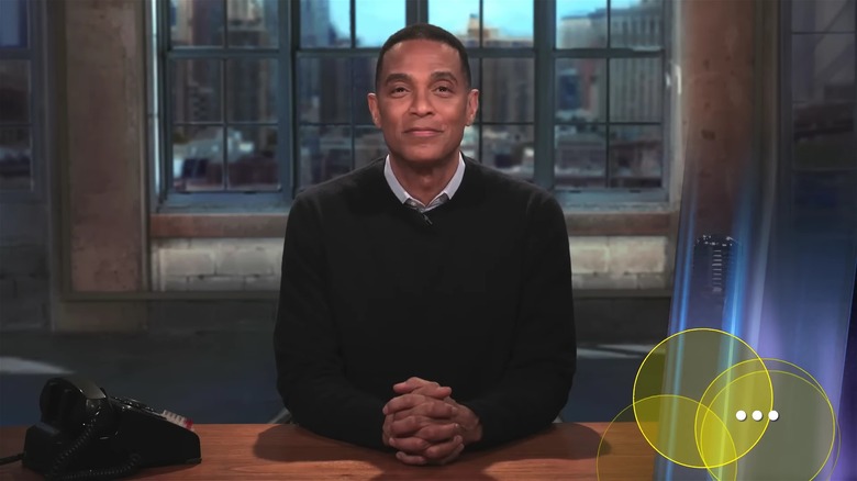 Don Lemon smiling, hands clasped