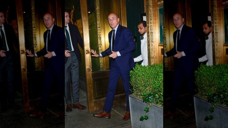 Matt Lauer exiting a door