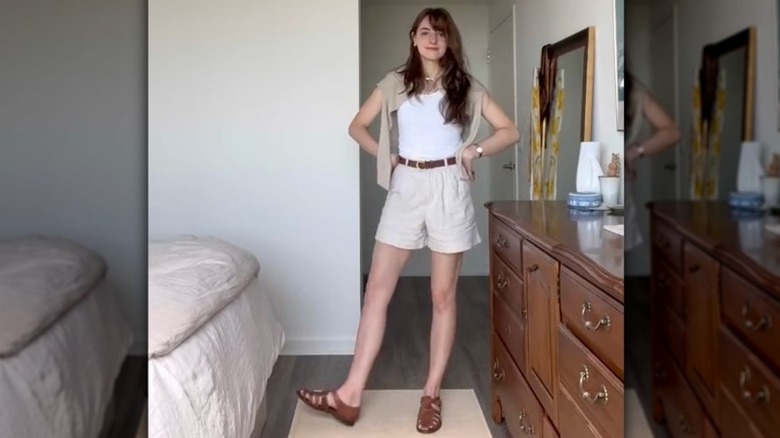 Woman wearing shorts and fisherman sandals