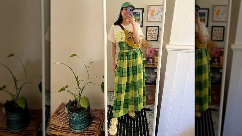 woman green plaid long skirt