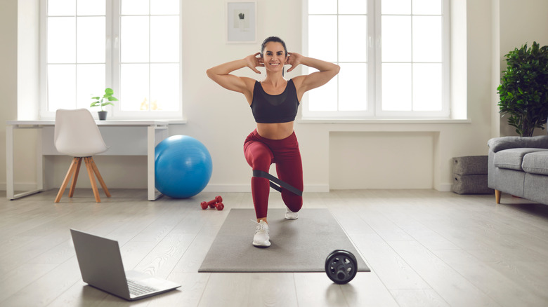 Woman working out on mat