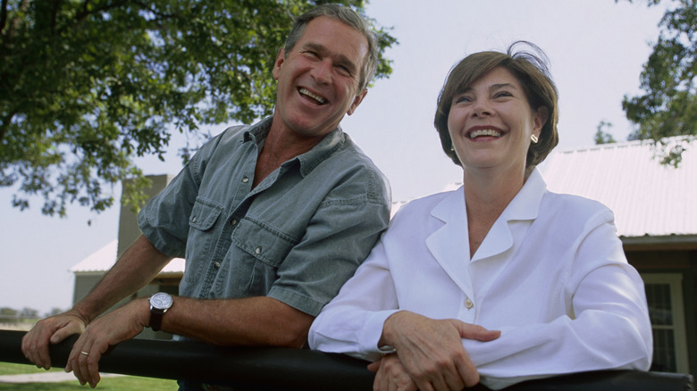 George W. Bush and Laura Bush laughing together