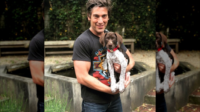 David Muir showing off his biceps