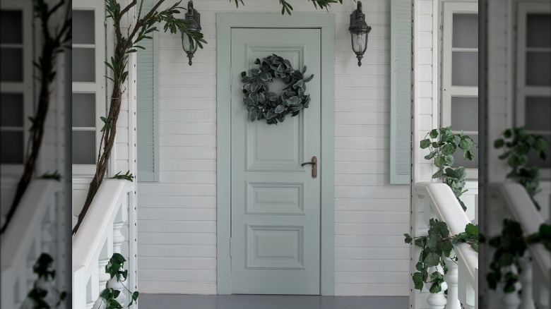 green door with wreath