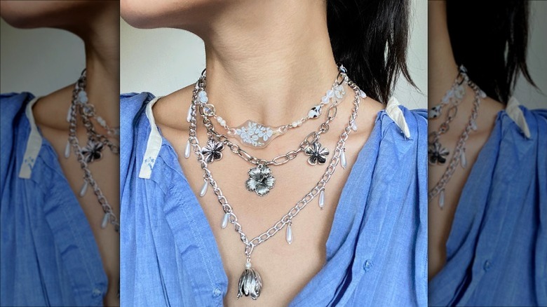 Layered necklaces on woman