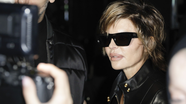 Lisa Rinna posing in sunglasse