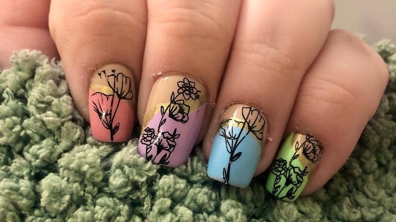 manicure with outlined flower details