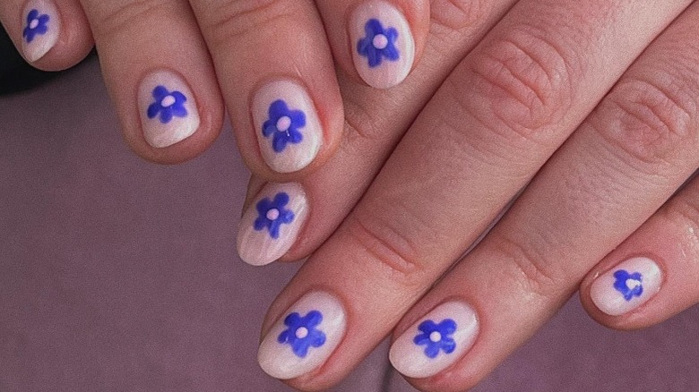 blue 70s flower nail design