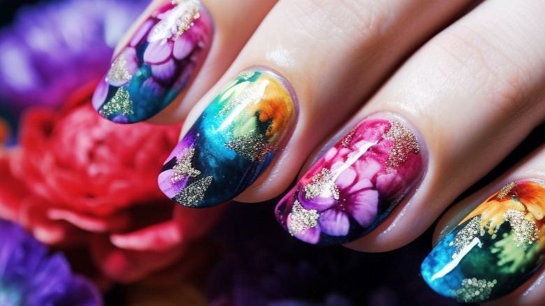 floral nail manicure with gold glitter