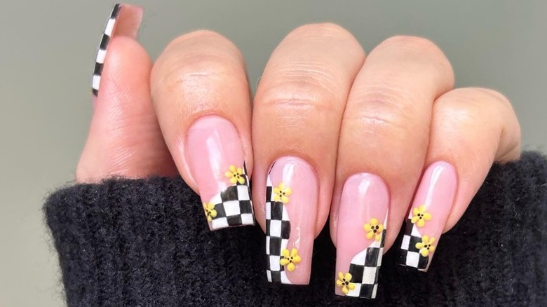 checkerboard nails with yellow flowers