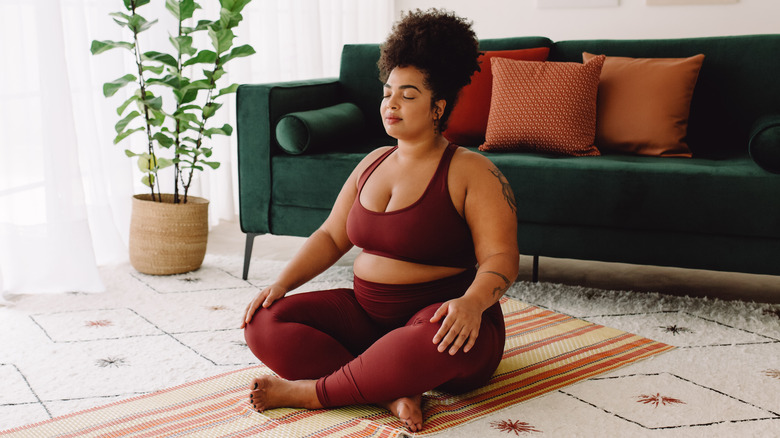 woman mediating during yoga