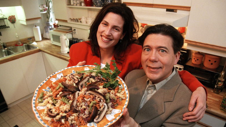 Ken Kostick and Mary Jo Eustace with a dish