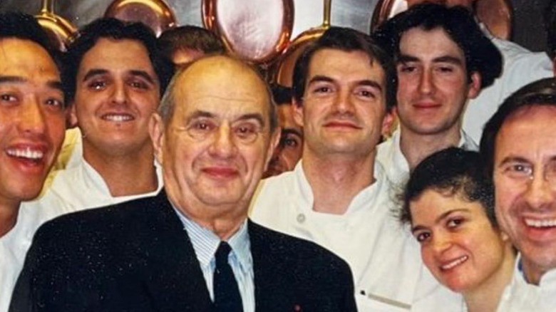 Throwback photo of Alex Guarnaschelli with Paul Bocuse and fellow chefs at Restaurant Daniel