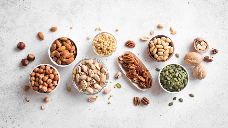 Nuts and seeds in bowls