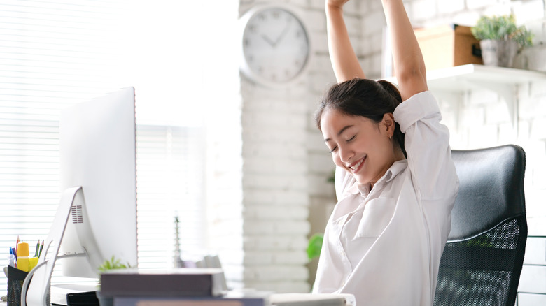 Woman in office chair