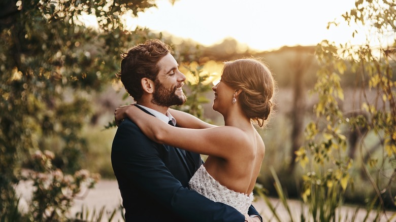 Married couple kissing