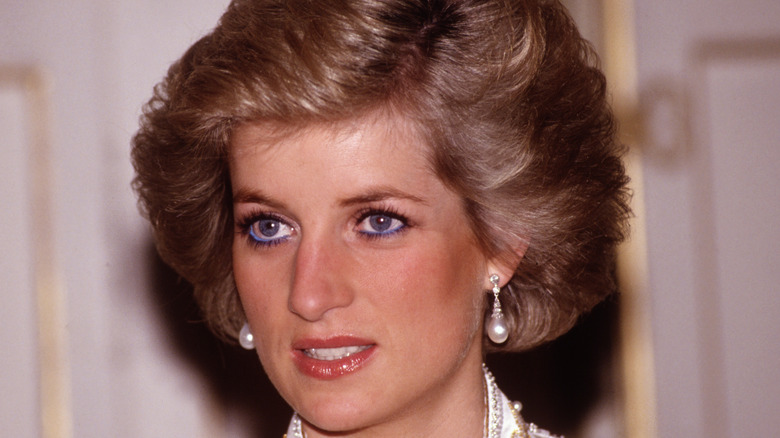 Princess Diana looking away