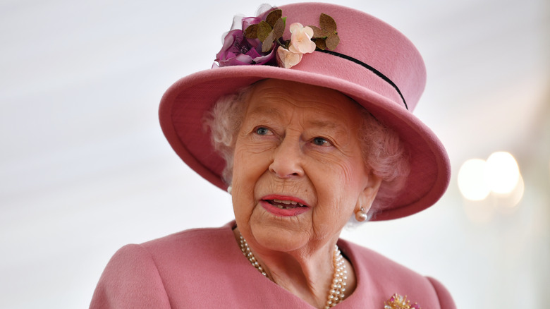 Queen Elizabeth wearing a bubble gum pink outfit