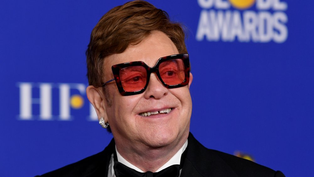 pop star Elton John, who enjoys an insanely lavish life