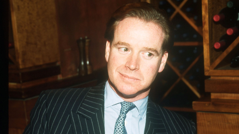 James Hewitt looking to the side