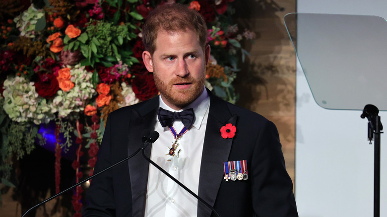 Prince Harry speaking onstage