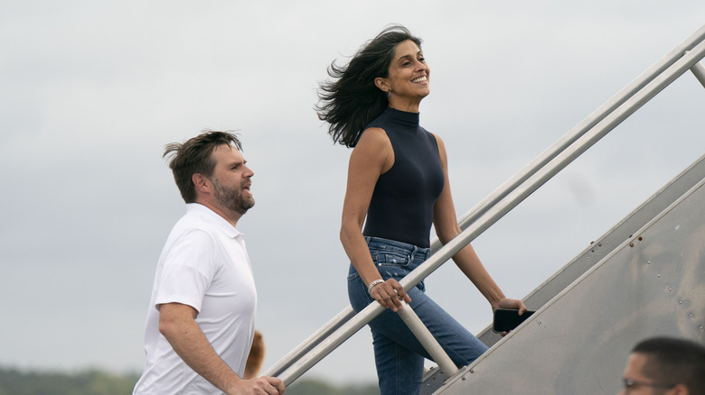 JD Vance and Usha Vance talking while boarding a plane