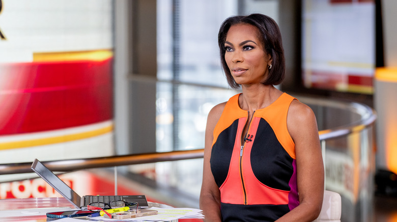 Harris Faulkner staring ahead in sleeveless shirt