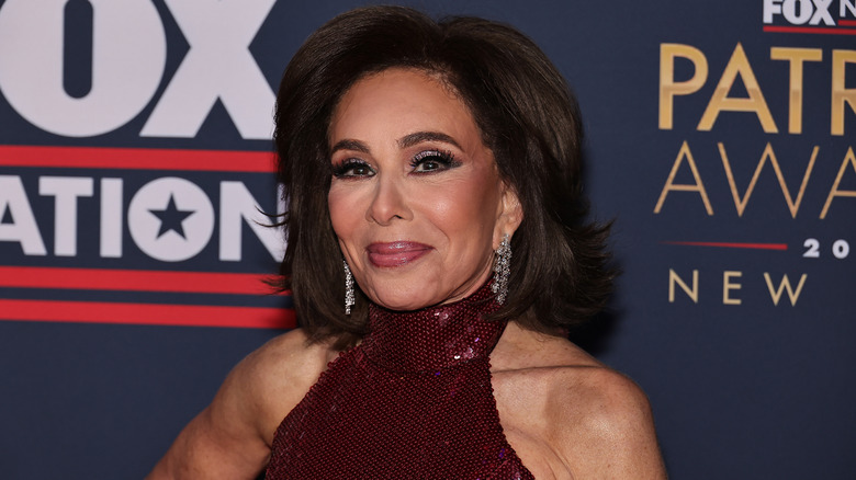 Jeanine Pirro posing on a red carpet