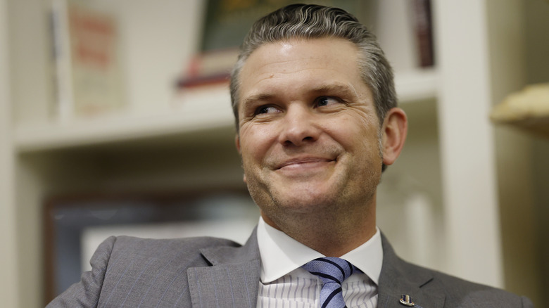 Pete Hegseth with a smirk