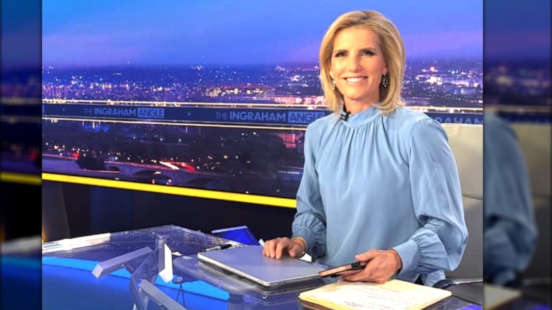 Laura Ingraham blue baggy blouse