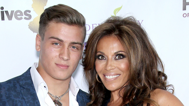 Dolores Catania poses with son Frankie at a Bravo event