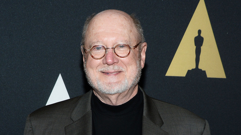 David Ogden Stiers wearing glasses