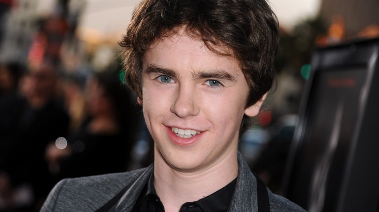 Freddie Highmore smiling red carpet