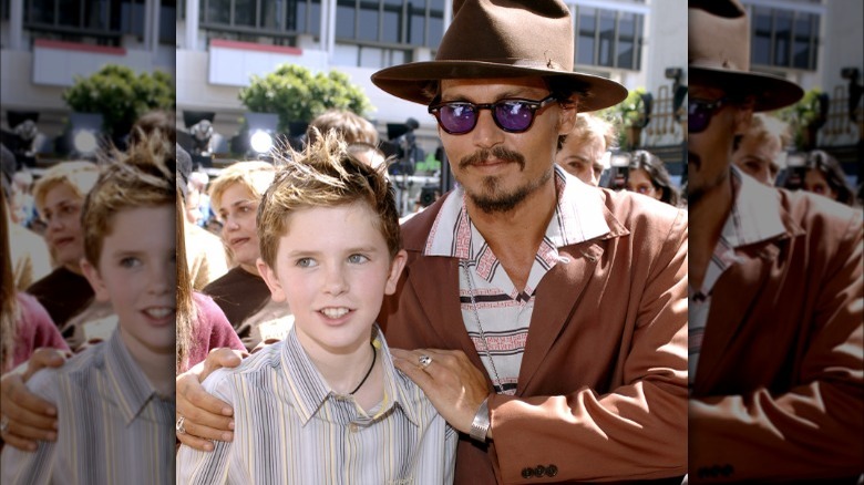 Freddie Highmore, Johnny Depp on red carpet