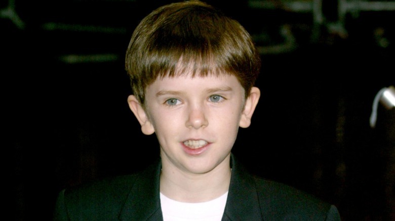 Freddie Highmore as a child