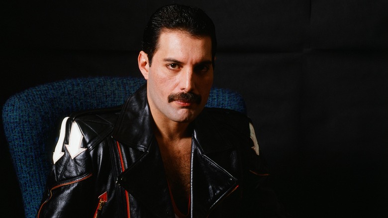 Freddie Mercury posing in black leather