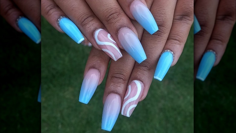 Blue tips with white swirls